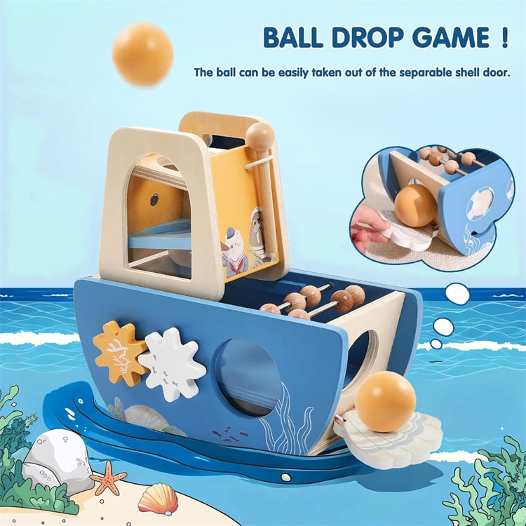 Toy boat with ball drop game feature on a beach-themed background