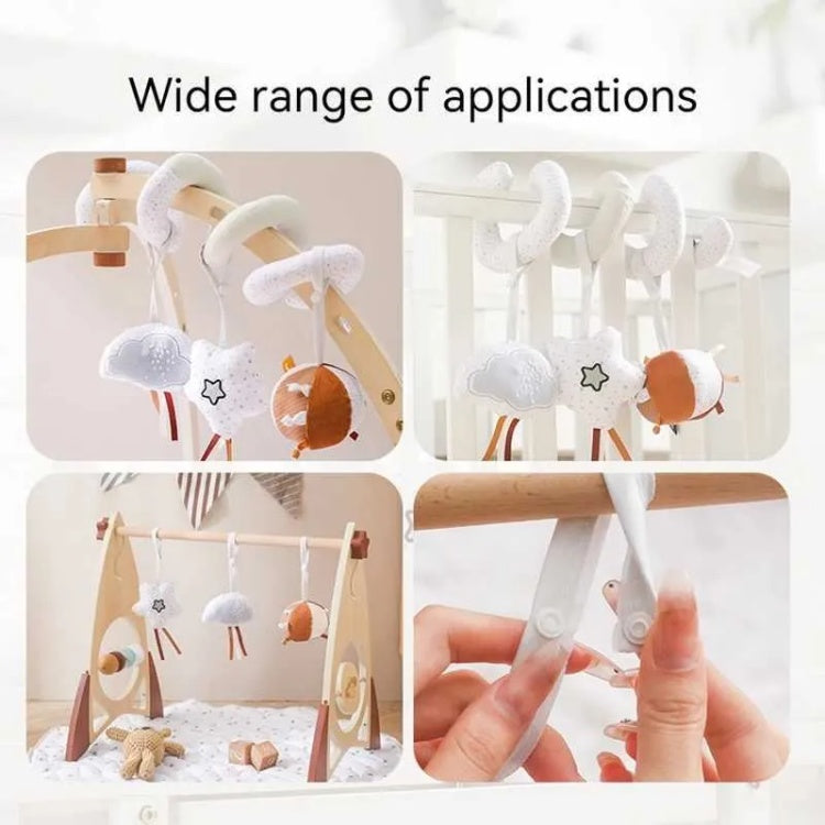 Baby mobile with hanging toys and text 'Wide range of applications' on a white background