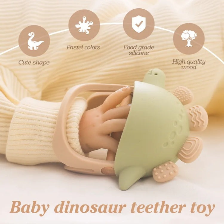 Baby dinosaur teether toy held by a hand, with features highlighted on a beige background.
