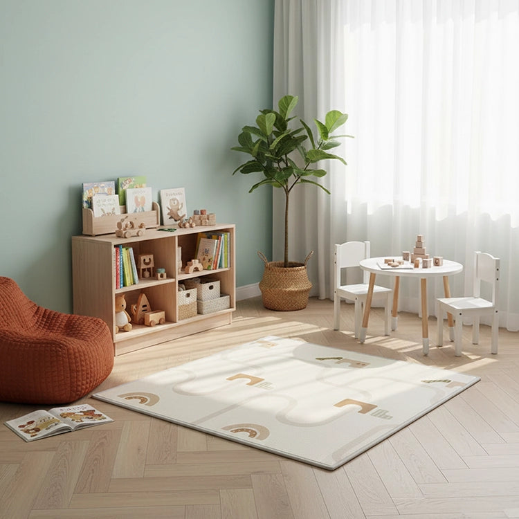 Children's playroom with a bookshelf, table, chairs, and rug.