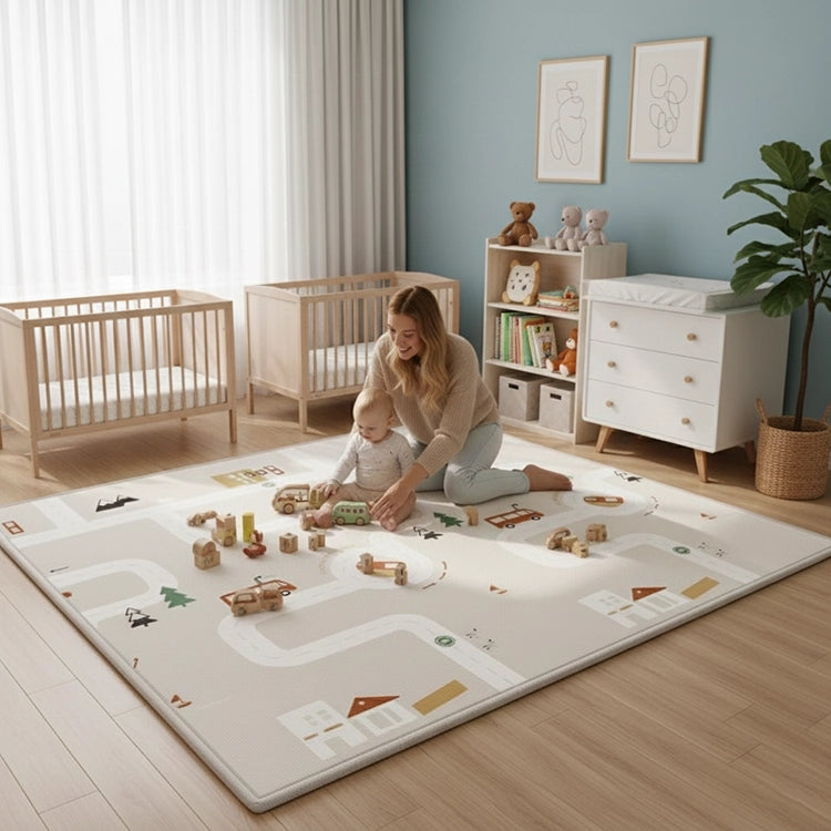 Woman and child playing on a large play mat in a nursery with furniture and toys around.
