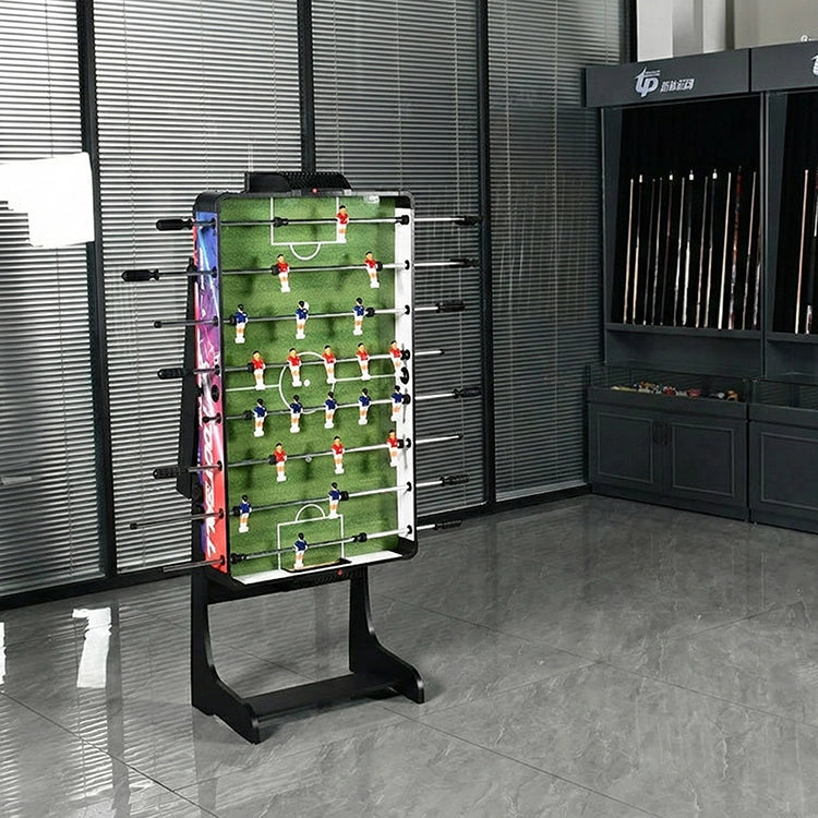 Futbolino table soccer game in a room with lockers