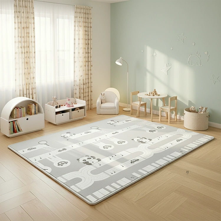 Children's playroom with a large gray and white rug featuring animal prints.