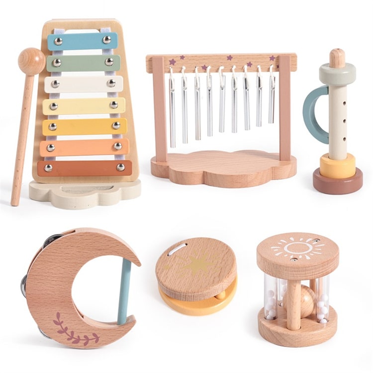 Set of wooden musical instruments on a white background