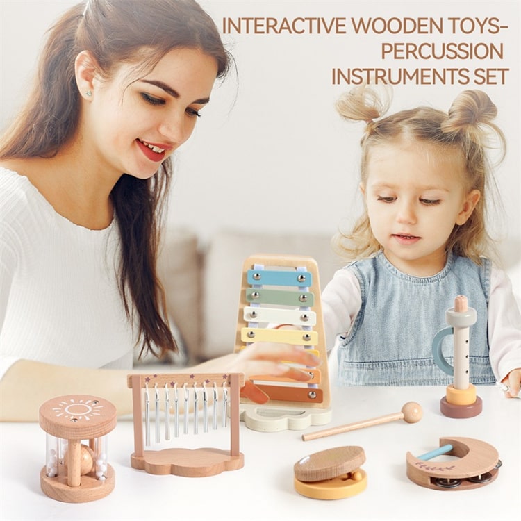 Woman and child playing with wooden percussion instruments on a white surface