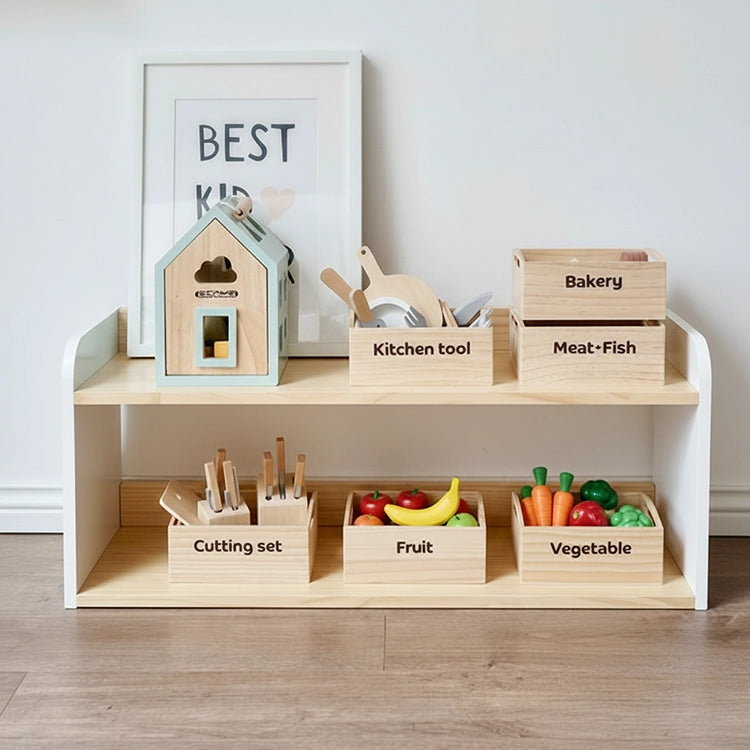 Wooden toy kitchen set with labeled boxes on a shelf.