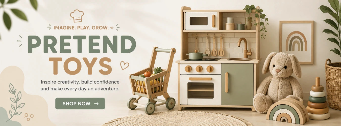 A styled interior scene showing a wooden play kitchen set with a small toy shopping cart, a plush bunny, stacked wooden rings, and a framed wall art piece in a warm neutral room. Large text on the left reads 'PRETEND TOYS' with smaller decorative copy and a 'SHOP NOW' button.