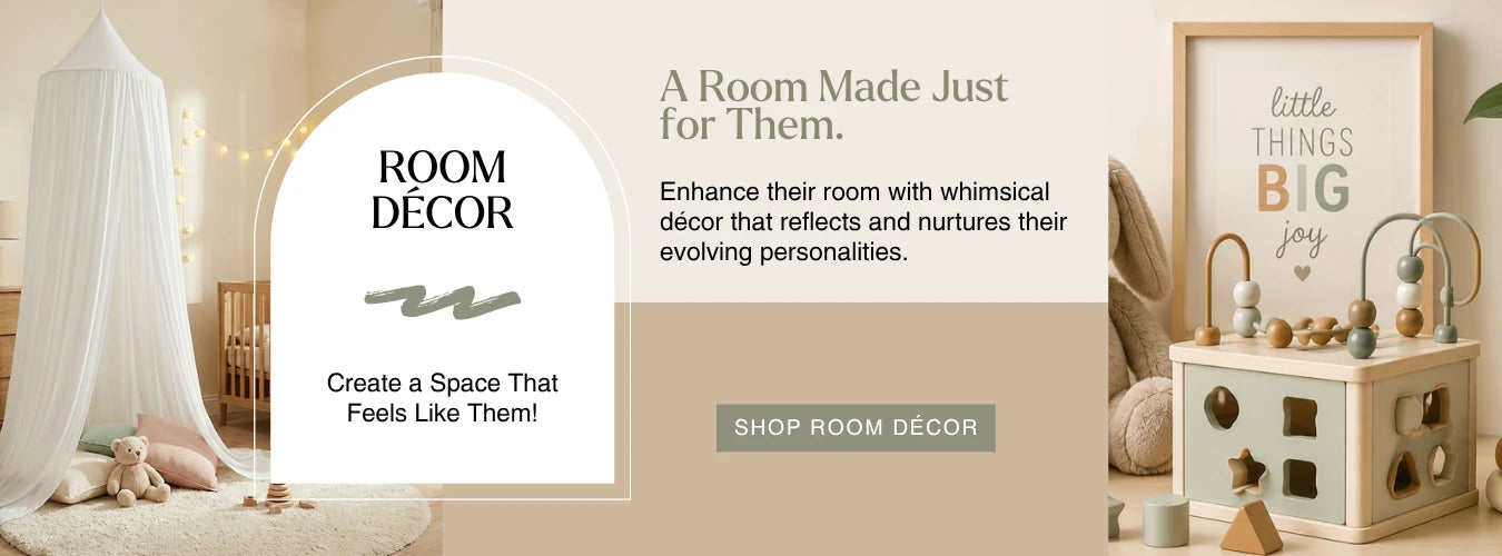 A promotional banner for Room Decor featuring a nursery room scene on the left with a white canopy, crib, and toys, alongside text reading 'ROOM DECOR' and 'A Room Made Just For Them.' A framed nursery sign and wooden toy cabinet appear on the right, with a 'SHOP ROOM DECOR' button at the bottom.