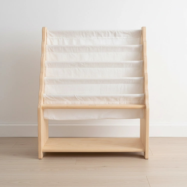 Wooden bookshelf with white fabric cover against a plain background