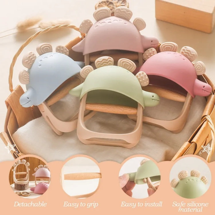Set of silicone turtle-shaped clips in various colors on a wooden surface.