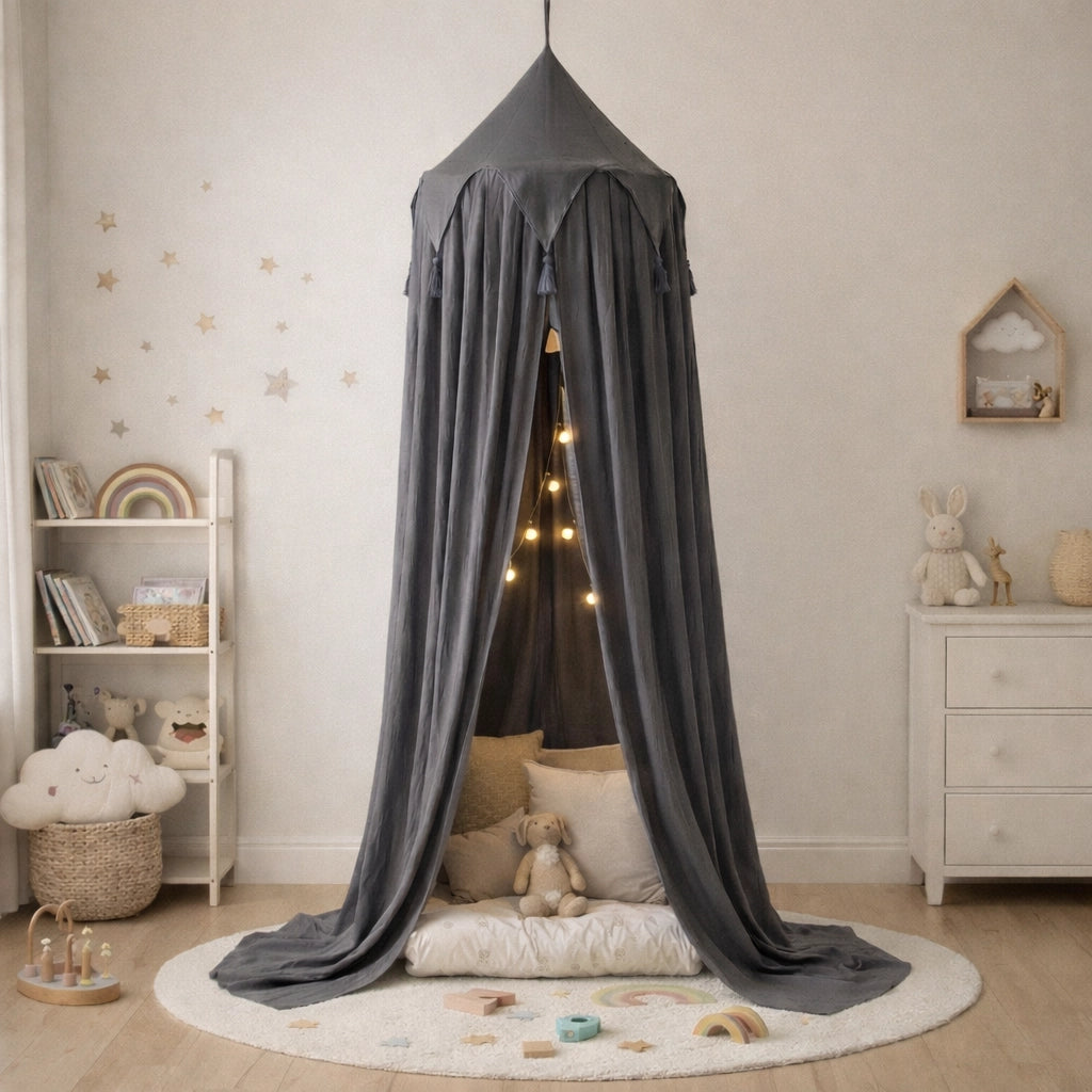 Gray canopy over a child's play area with toys and a shelf in a room.